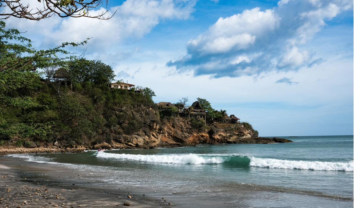 Coastal landscape with waves breaking below cliffs in Nicaragua